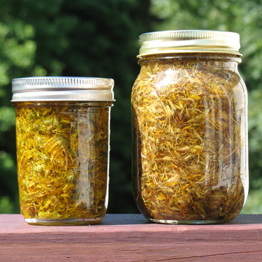 Calendula oil in jars